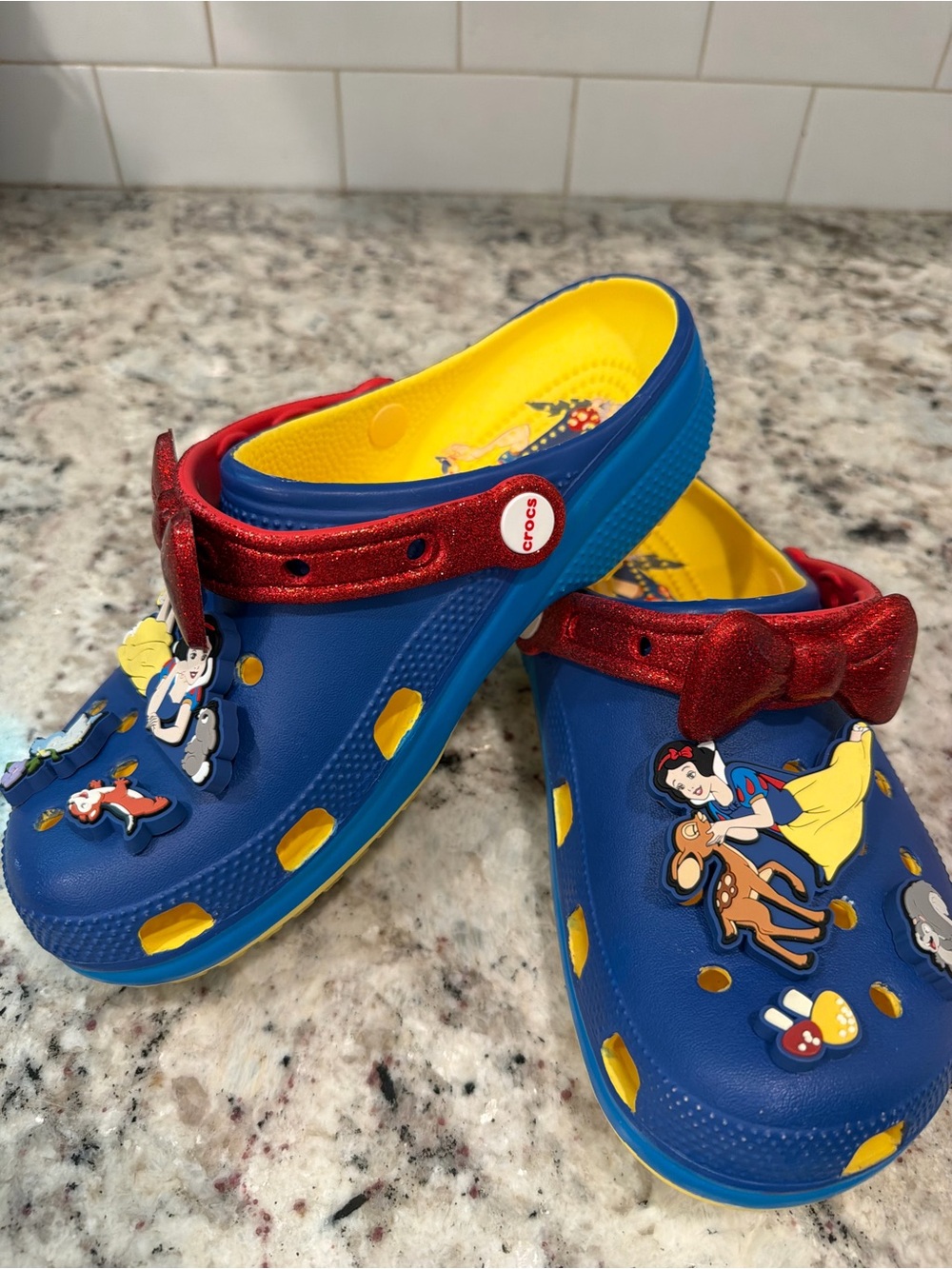 CROCS Kids Blue Clogs with Red Glitter Strap and Yellow Accents